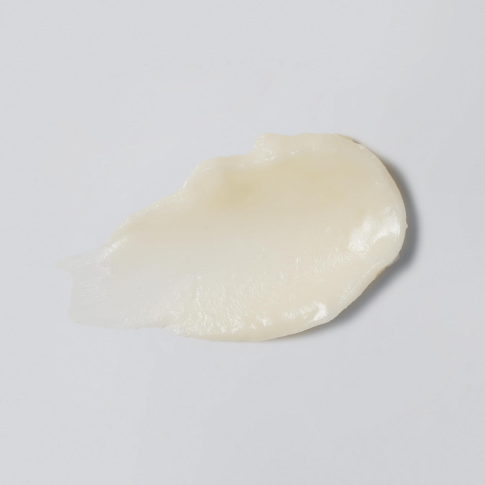 Texture closeup of Versed Smooth Landing eye balm smoothing fine lines