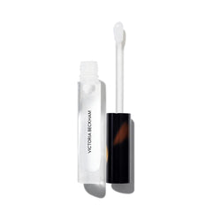 Victoria Beckham Beauty High Gloss Lip Gloss bottle shines for evening wear.