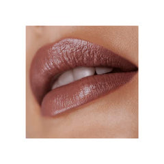 Victoria Beckham Posh Lipstick open cap reveals creamy texture for smooth application.