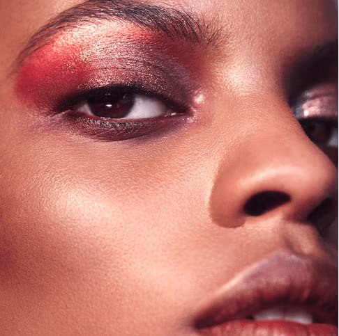 Victoria Beckham Beauty Shimmery Lid Lustre texture detail reveals delicate shimmer.