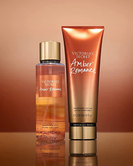 Victoria's Secret Amber Romance lotion close-up shows nourishing texture for silky skin.