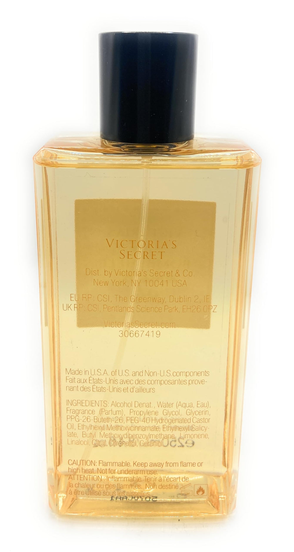 Victoria's Secret Bombshell Amalfi body mist bottle close-up showing notes of tangerine and blossom.