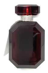 Victoria's Secret Bombshell Midnight warm glow ambience image, suggesting evening wear fragrance.