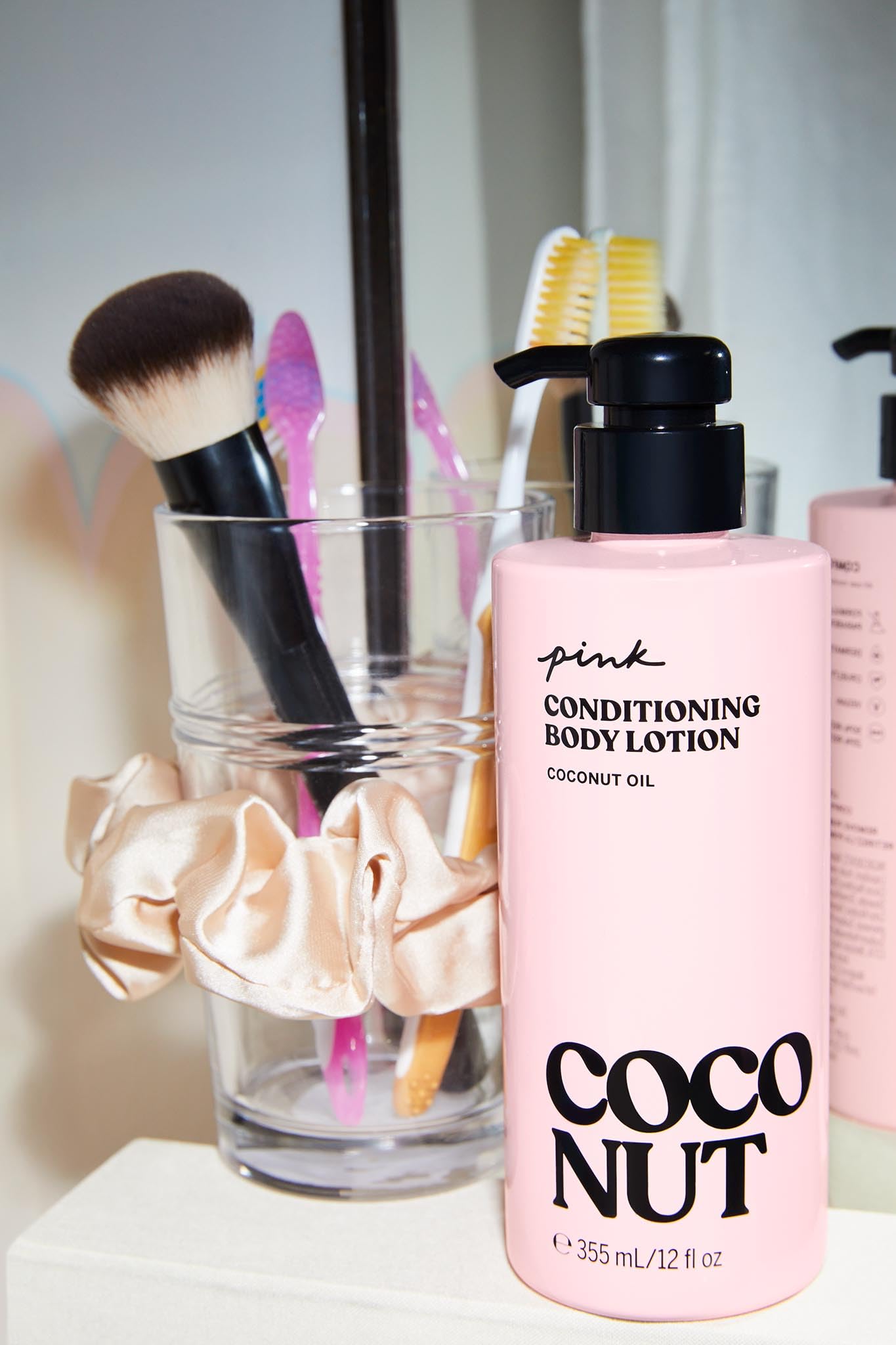 Victoria's Secret Pink Coco lotion on skin delivers a soft glow and lasting moisture.