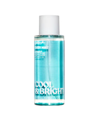 Victoria's Secret Pink Cool and Bright bottle pouring mist for a refreshing lift.