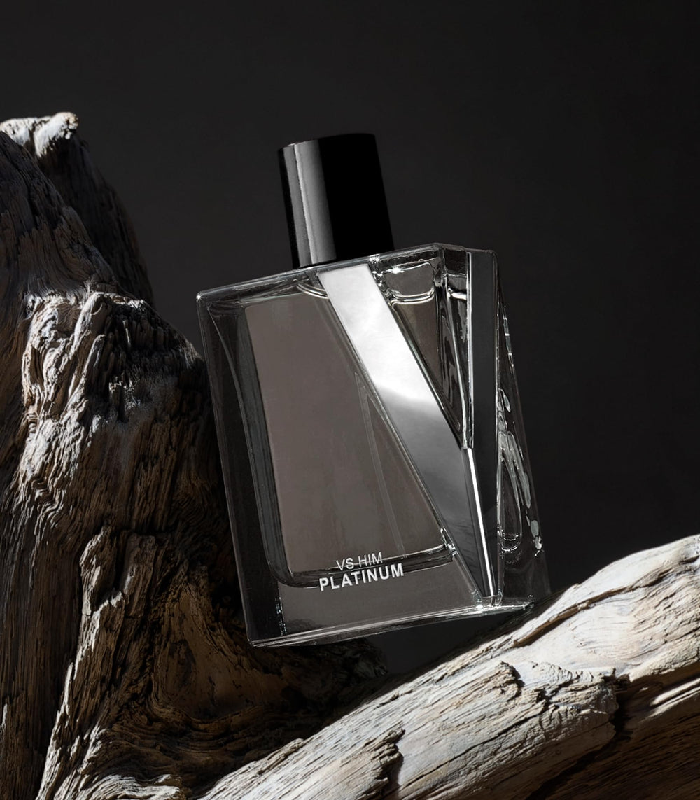 Victoria's Secret Platinum Him eau de parfum label, aromatic woody notes highlighted.
