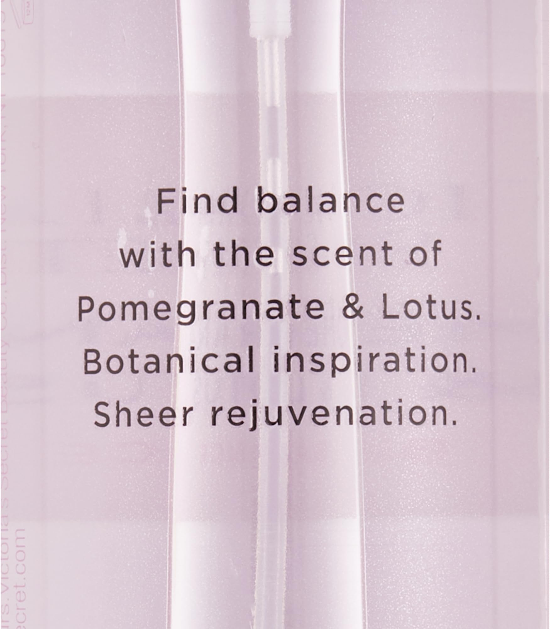 Victoria's Secret Pomegranate and Lotus spray on pulse points for everyday elegance.
