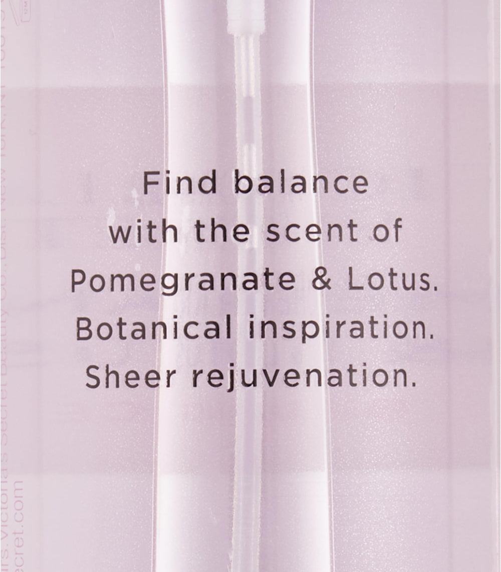 Victoria's Secret Pomegranate and Lotus spray on pulse points for everyday elegance.