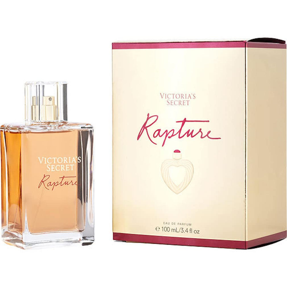 Victoria’s Secret Rapture EDP bottle on vanity; warm, spicy floral scent for evening wear.