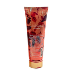 Close-up of Victoria's Secret Rich Honeysuckle Apricot lotion highlighting smooth skin and scent