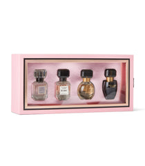 Victoria's Secret Tease bottle close-up, warm gourmand scent for evening wear.