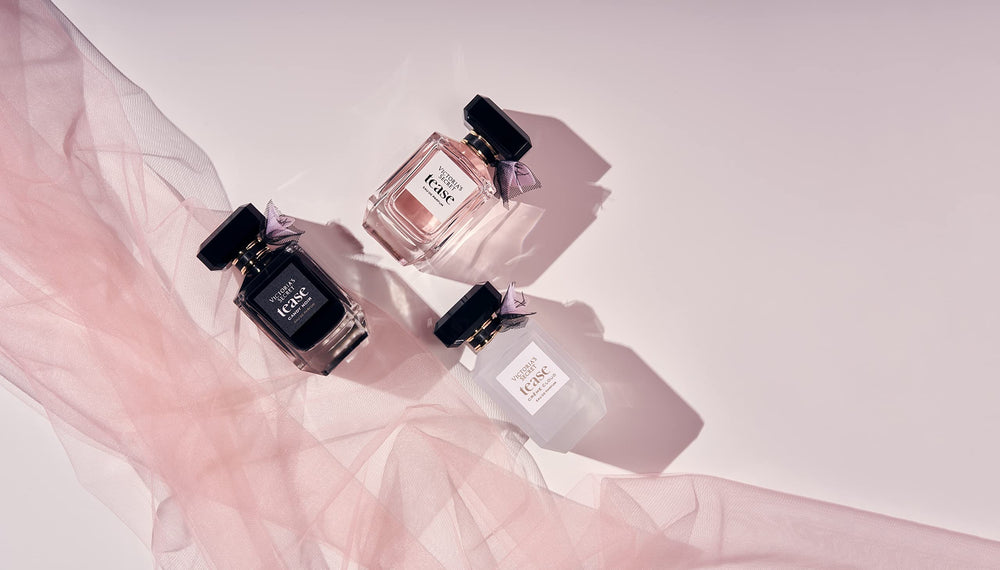 Fragrance lotion beside Tease Creme Cloud bottle for layering.