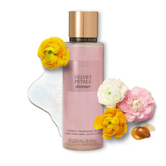 Victoria's Secret Velvet Petals Shimmer bottle close-up, showcasing luxe packaging and subtle glow.