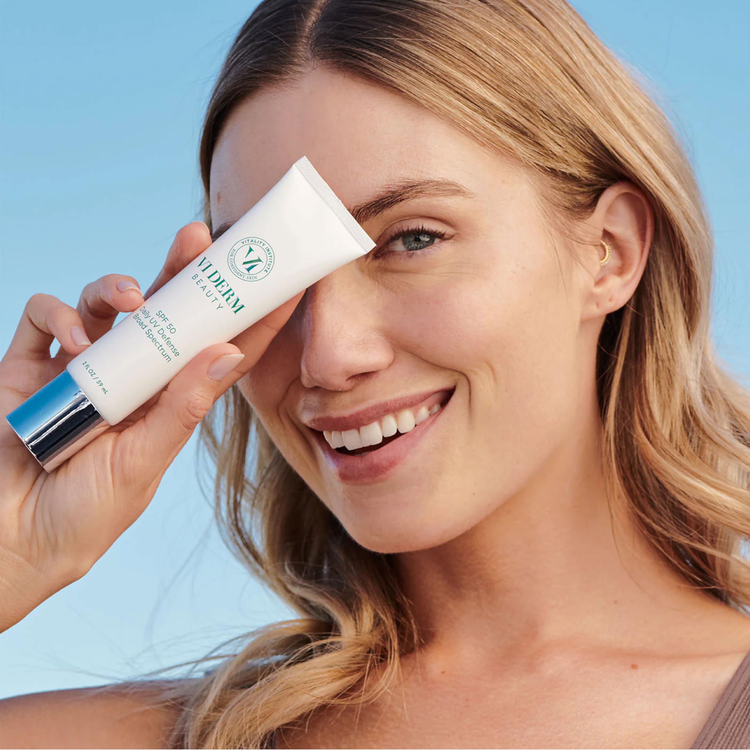VI Derm SPF 50 packaging showcasing travel-friendly bottle.