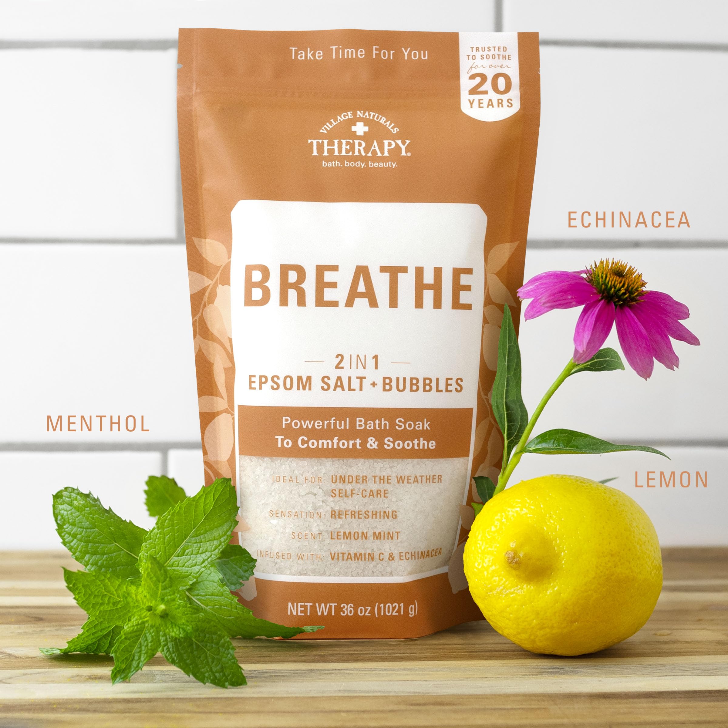 Village Naturals Therapy Breathe tub scene with inviting foam and peppermint aroma