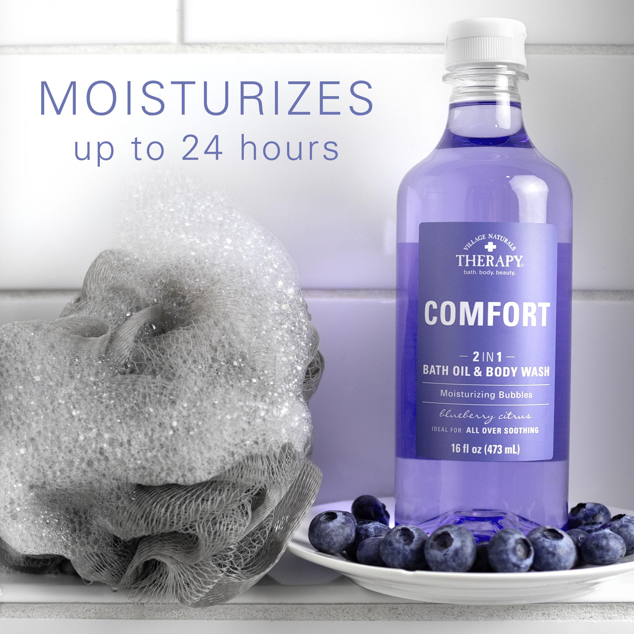 Tub filled with Village Naturals Therapy Comfort 2-in-1 for a calming soak.