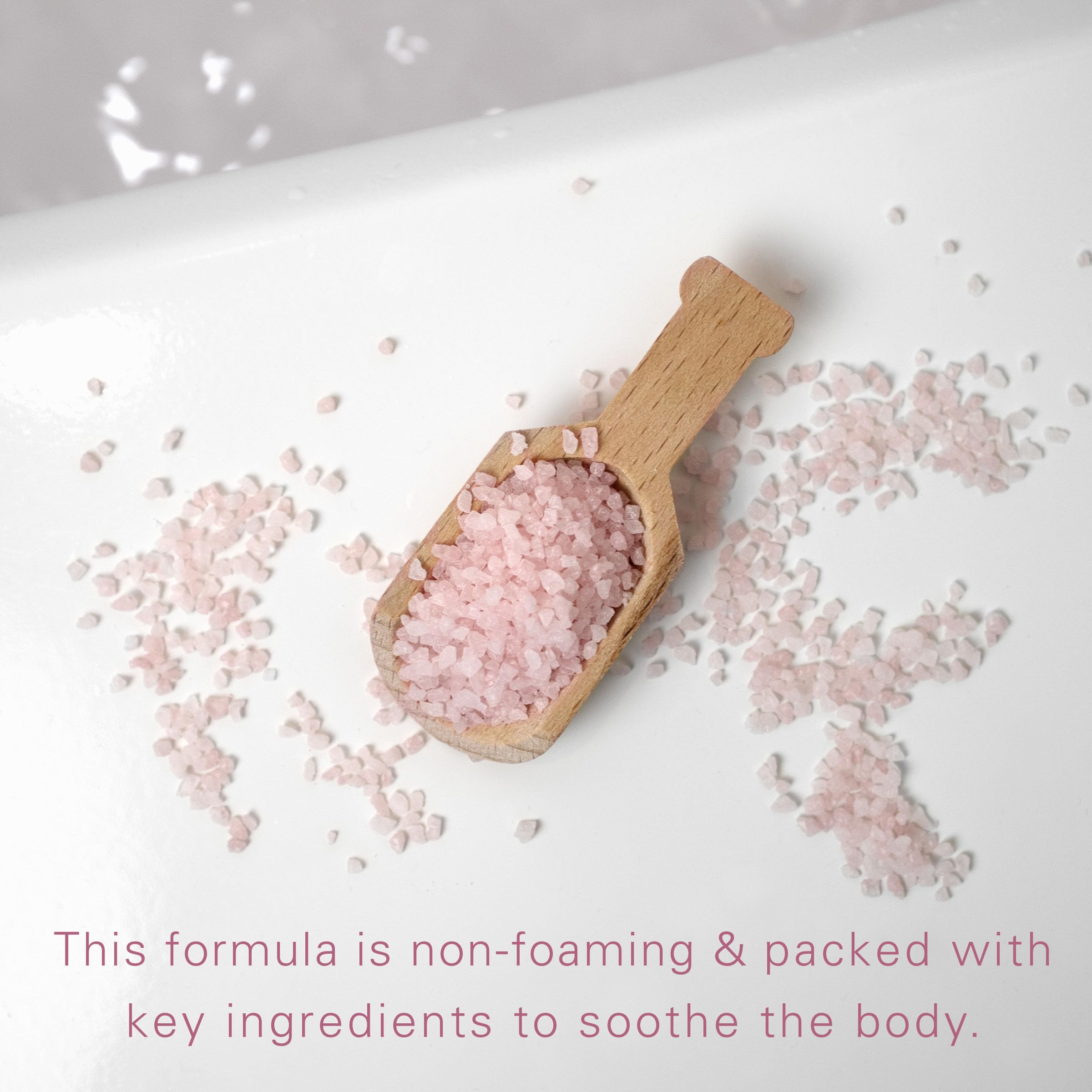 Village Naturals Therapy Glow bottle against Moroccan decor evokes luxury bath time