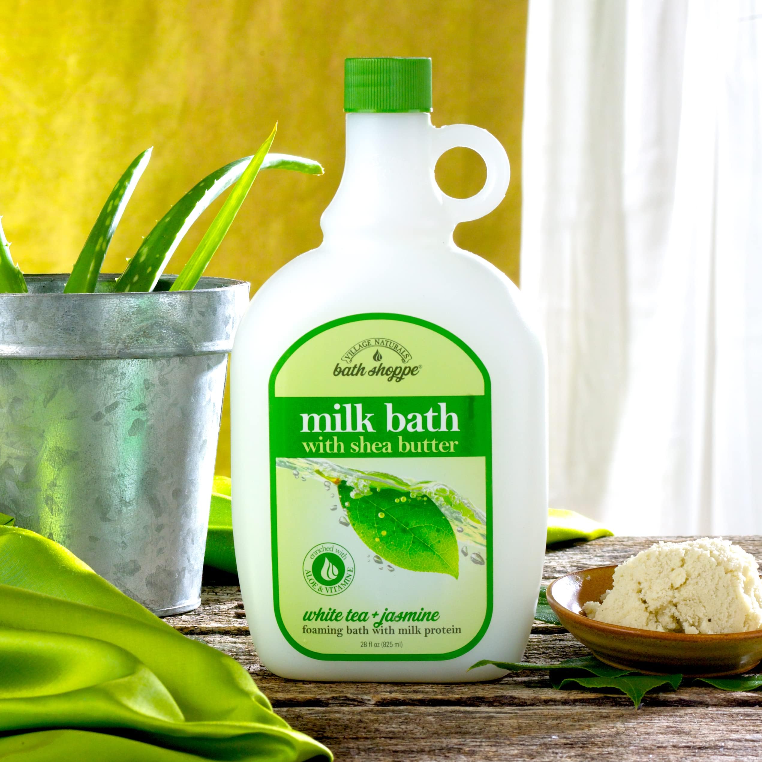Pour Village Naturals Bath Shoppe foam bath under warm water to create lush bubbles