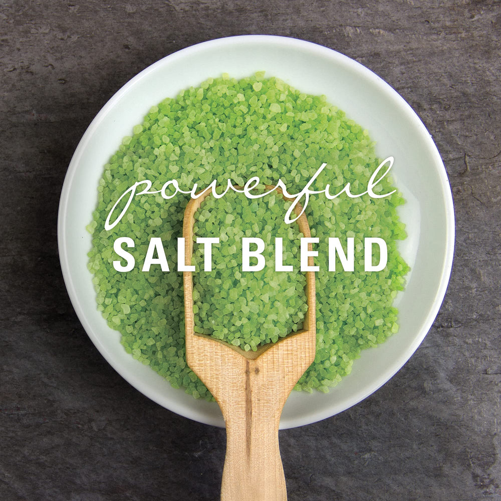 Spa-like bath scene featuring Village Naturals Therapy Muscle Bath Soak