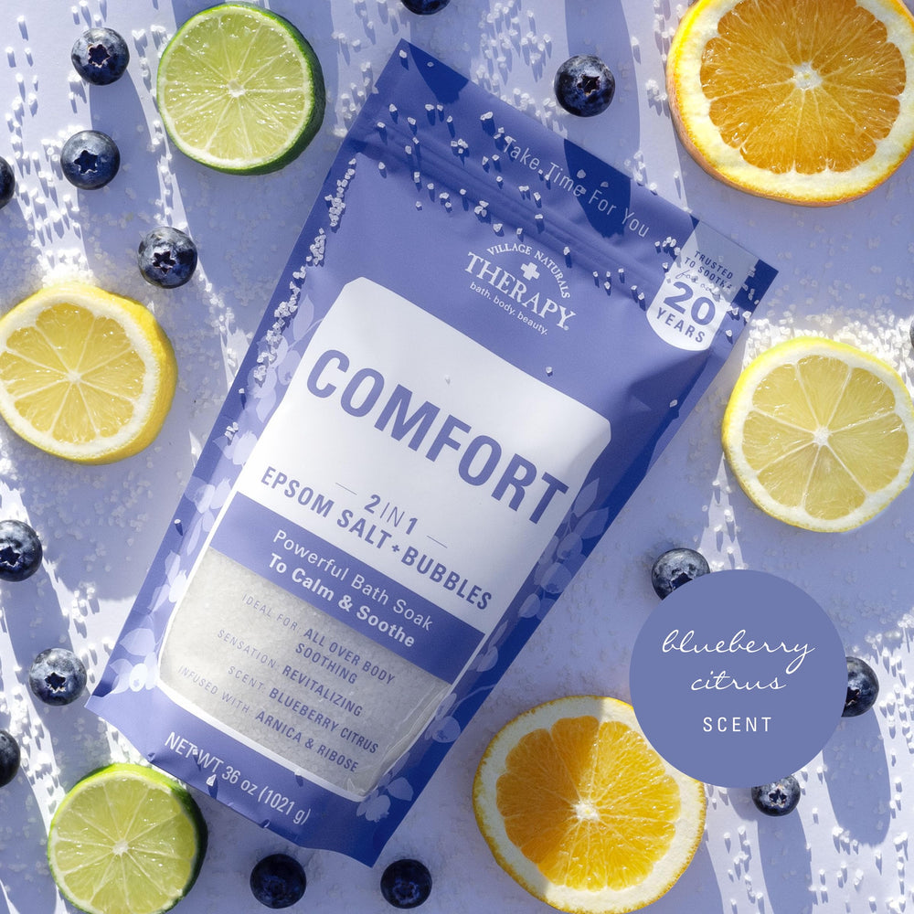 Village Naturals Therapy Comfort Foaming Bath Soak featuring arnica and blueberry oils