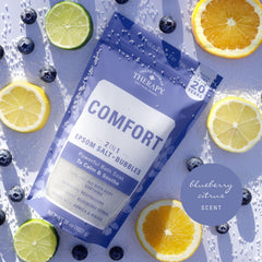 Village Naturals Therapy Comfort Foaming Bath Soak featuring arnica and blueberry oils