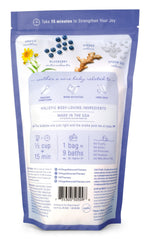 Village Naturals Therapy Comfort Foaming Bath Soak Blueberry Citrus scent fills the bathroom