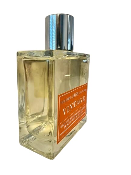 Vintage Eau de Cologne 1956 label close-up, retro typography suggests heritage fragrance.
