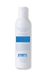 Virgo de Novo Blue Toning Shampoo pump close-up shows non-drying cleansing.