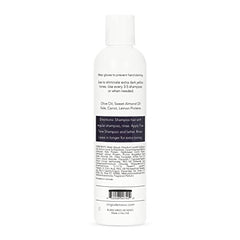 Virgo de Novo Extra Dark Purple Shampoo pour showing even application for consistent toning.