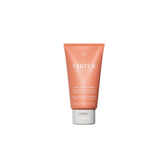 VIRTUE Curl Conditioner bottle close-up shows jojoba oil for hydrated curls