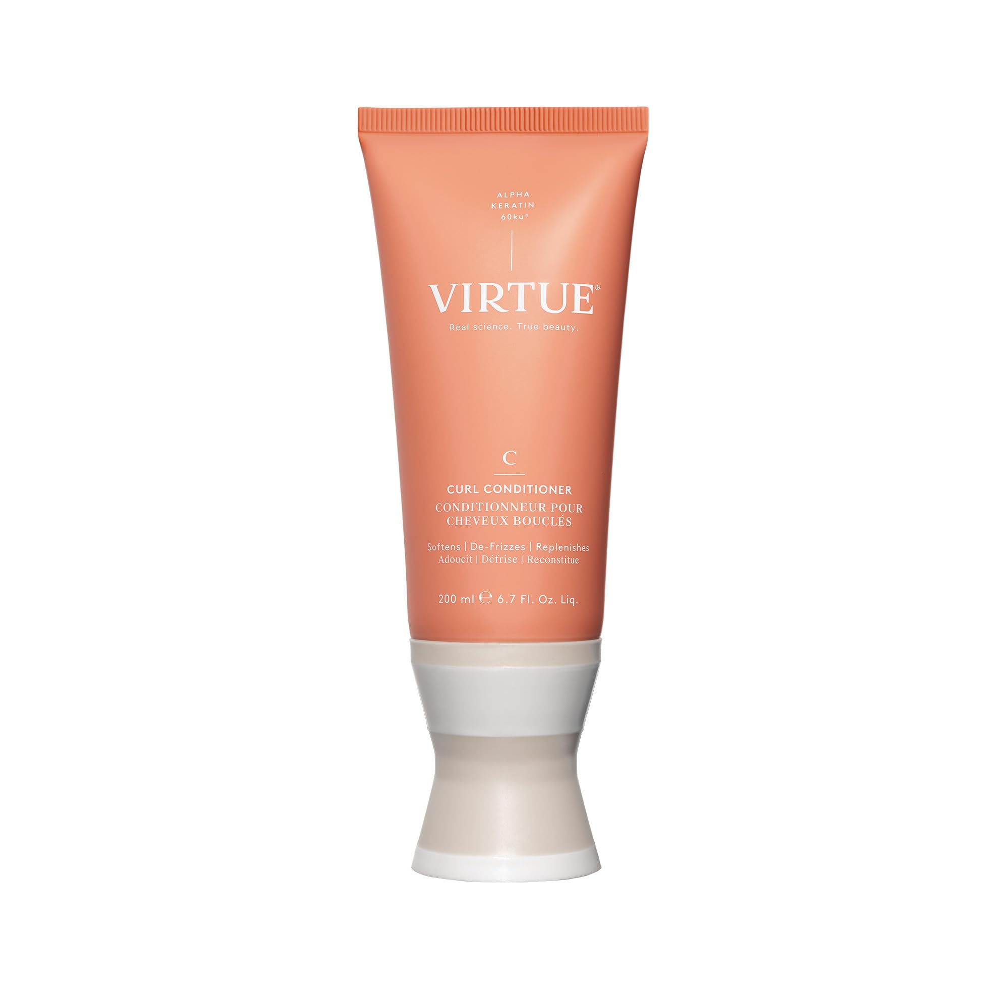 VIRTUE Curl Conditioner bottle with jojoba oil delivering hydrated curls.