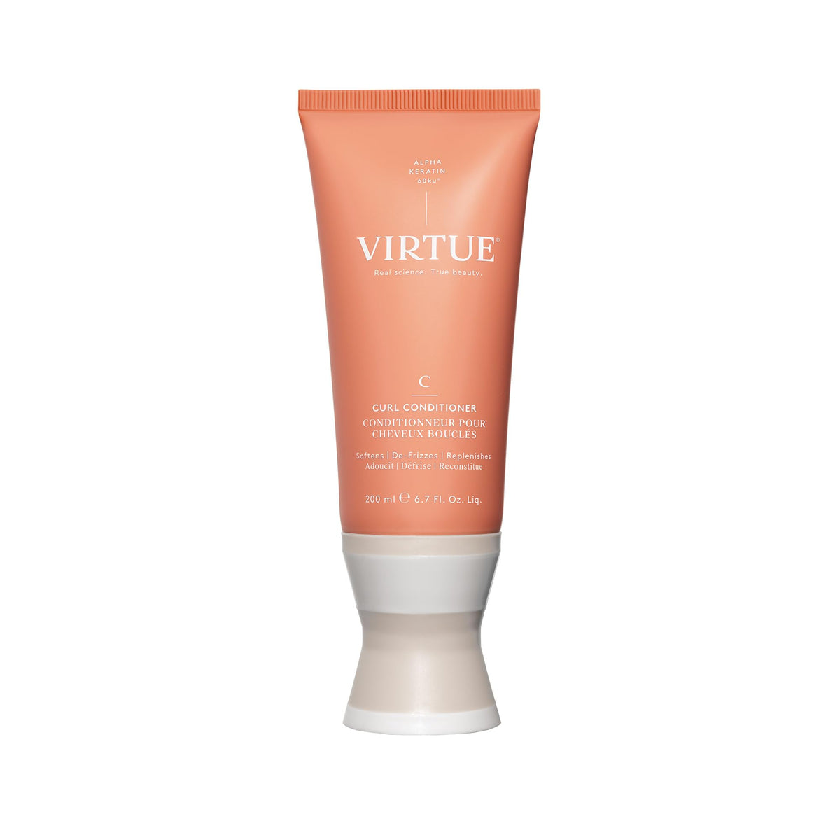 VIRTUE Curl Conditioner bottle with jojoba oil delivering hydrated curls.