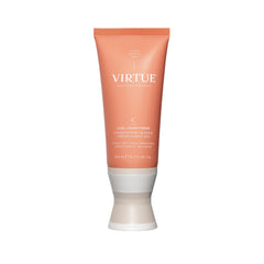 VIRTUE Curl Conditioner bottle with jojoba oil delivering hydrated curls.
