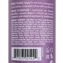 Pouring Virtue Flourish shampoo for easy application and scalp refresh.