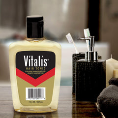 Vitalis Hair Tonic bottle cap close-up showing a lightweight, non-greasy formula.