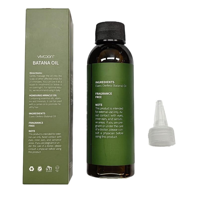 Vivccon Batana Oil being poured for even application.