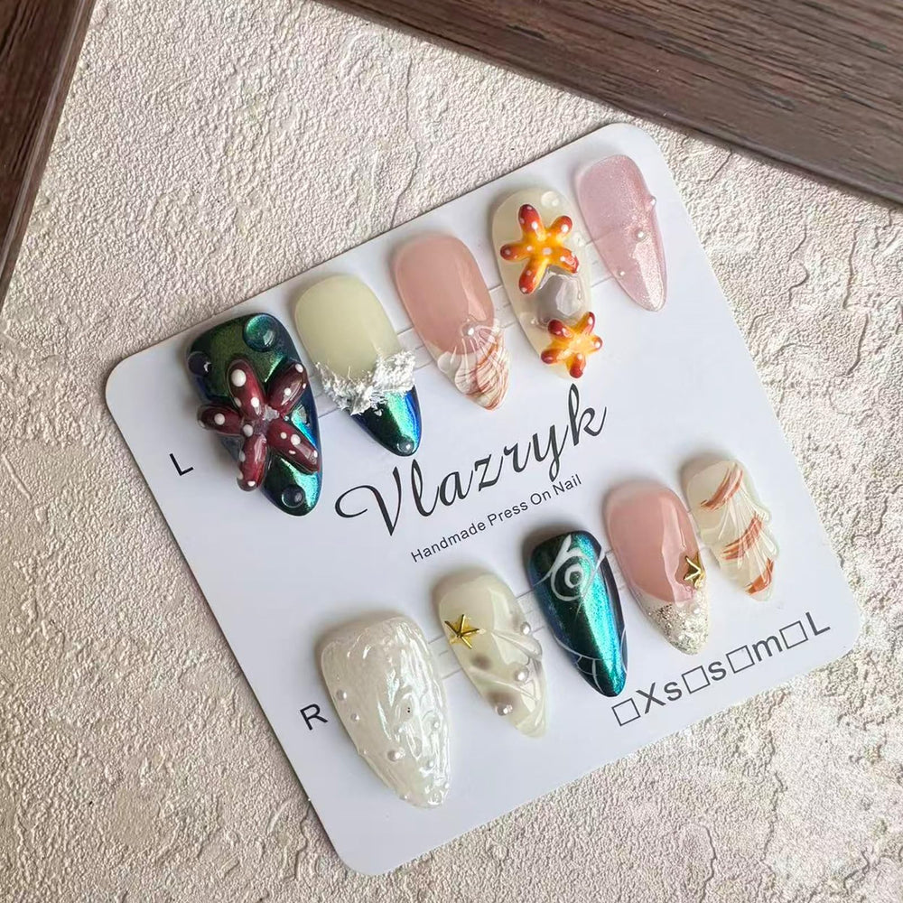Vlazryk handmade 3D nails with almond shape and rich texture