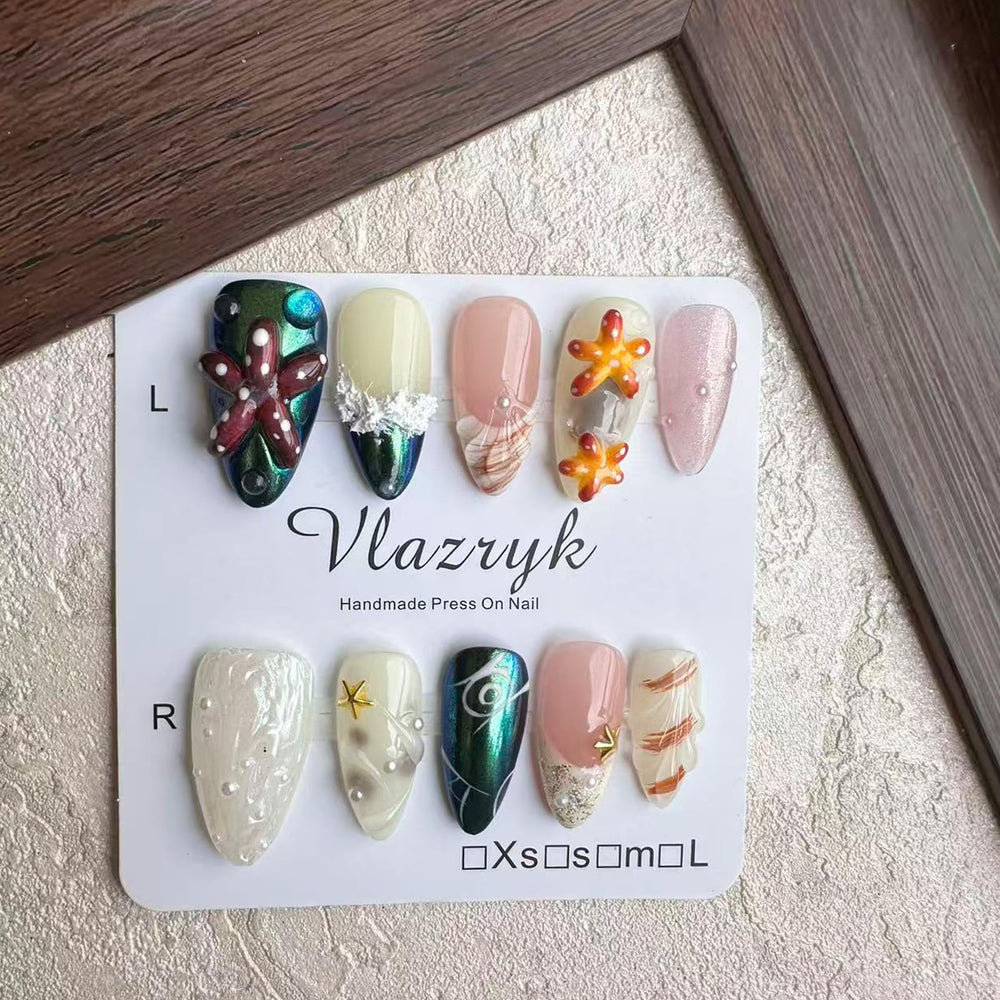 Vlazryk Seabed World-inspired nails suit casual or formal looks