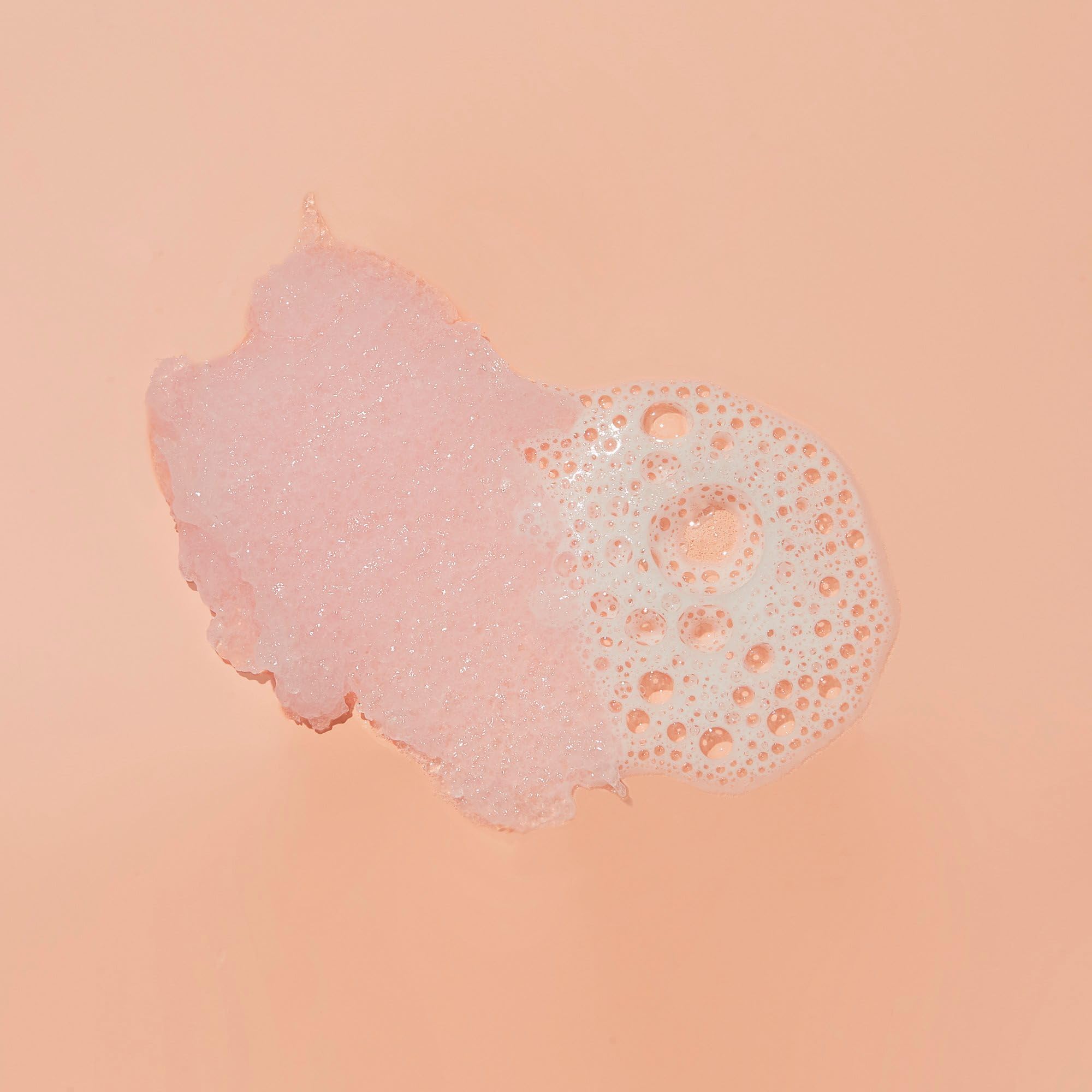 Bubble wash foam showcasing creamy texture for body and scalp care.
