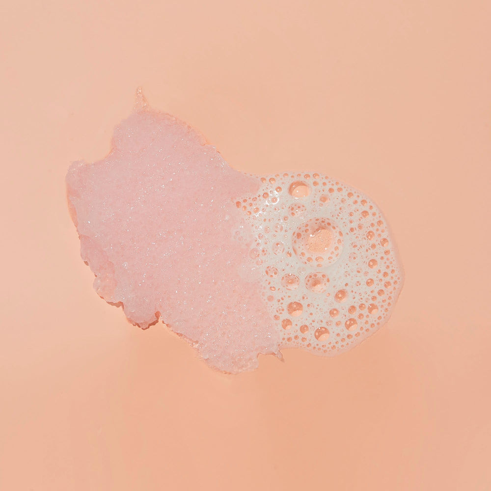 Bubble wash foam showcasing creamy texture for body and scalp care.