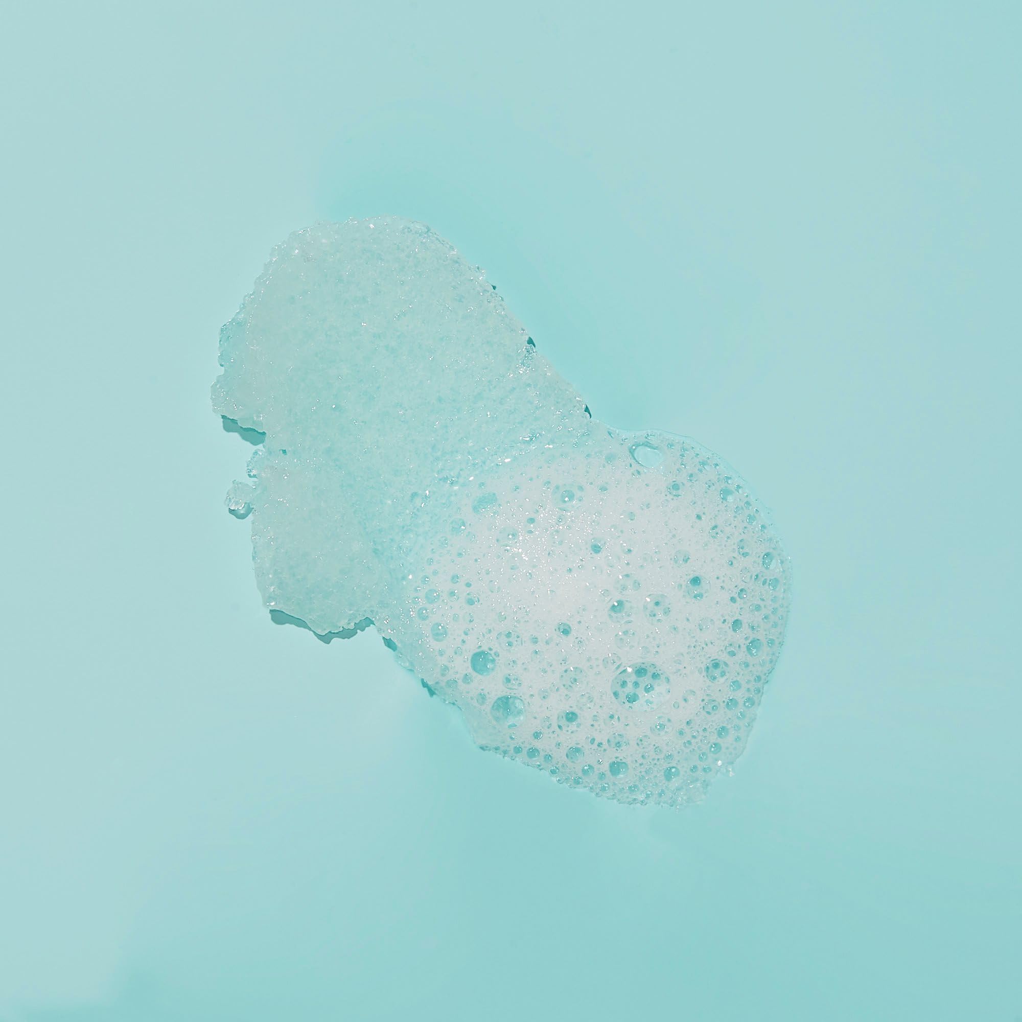 VOESH sugar scrub forming rich lather on skin.