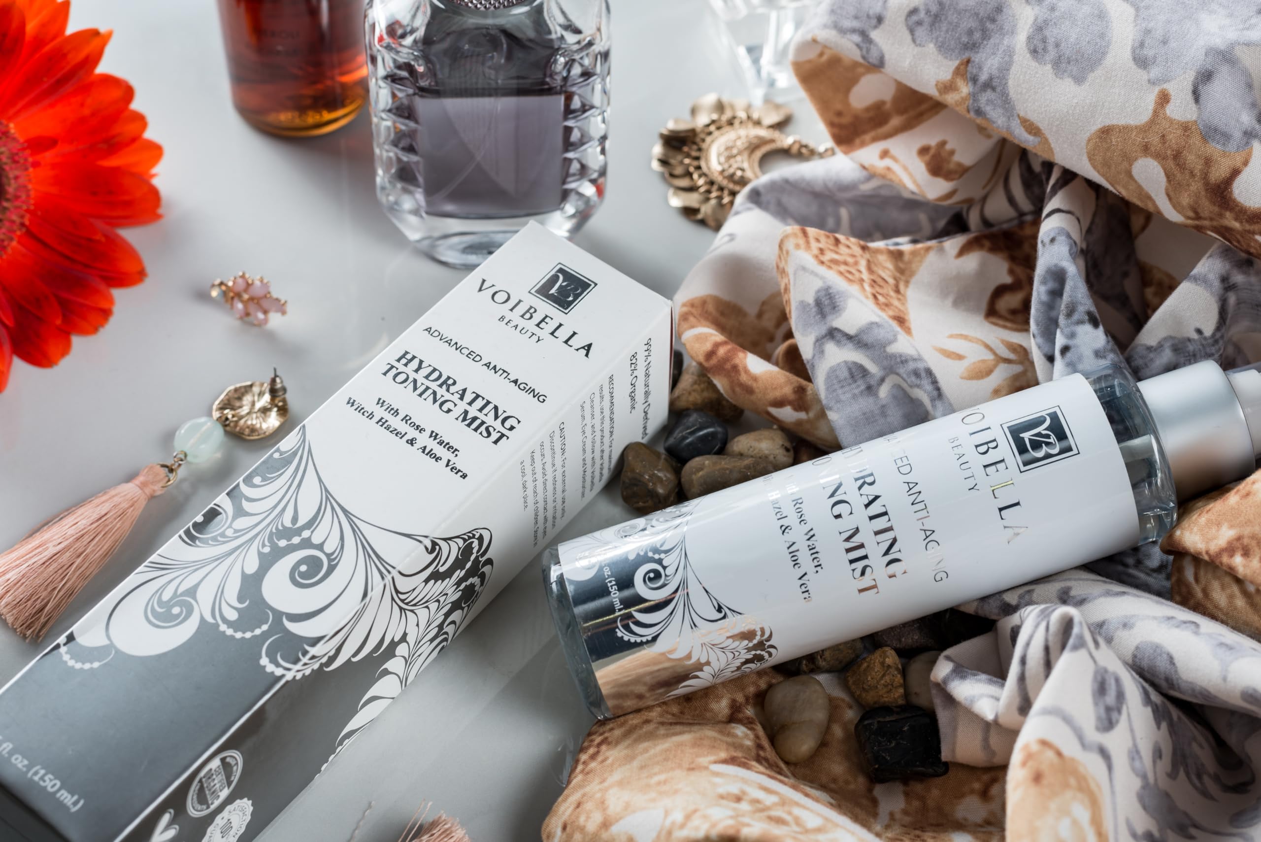 VOIBELLA BEAUTY toner used on face and neck for freshness.