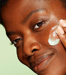 Volition Celery Green Cream being applied on skin shows quick absorption.