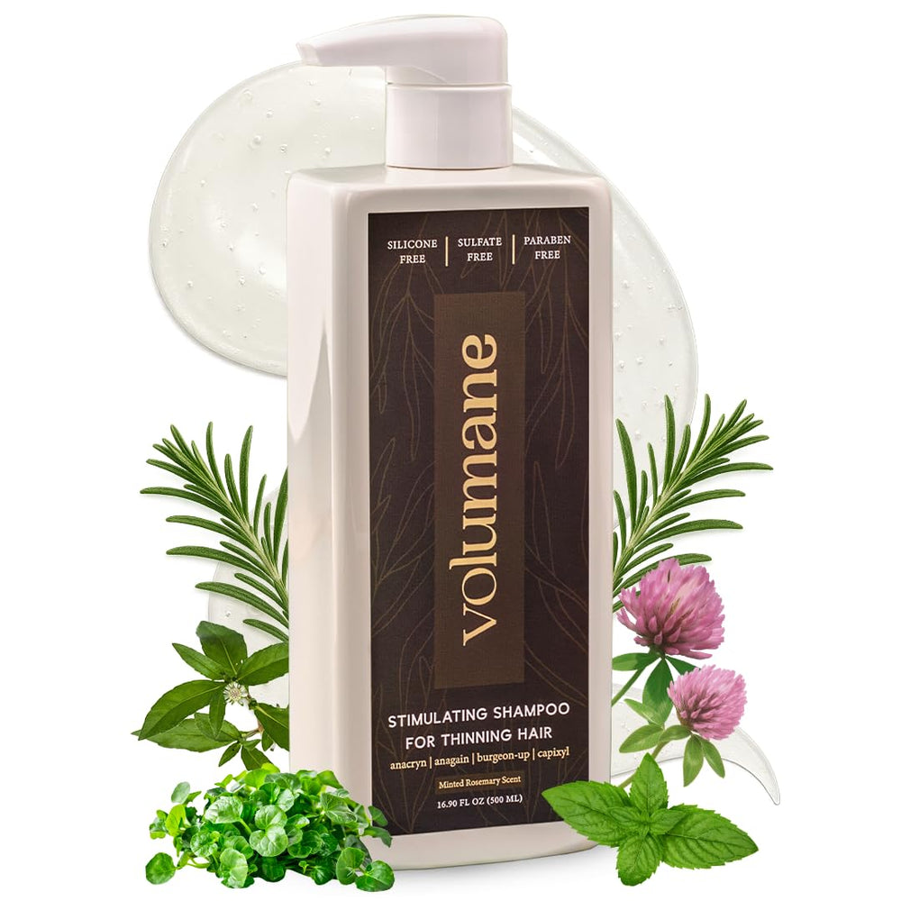 Volumane anti-thinning shampoo bottle in hand, daily use toward fuller-looking hair.