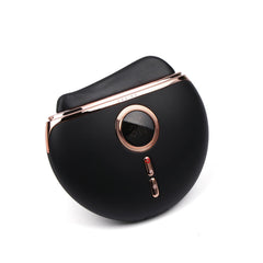 VRAIKO Eclipse massager with black shell ready for a skincare session.
