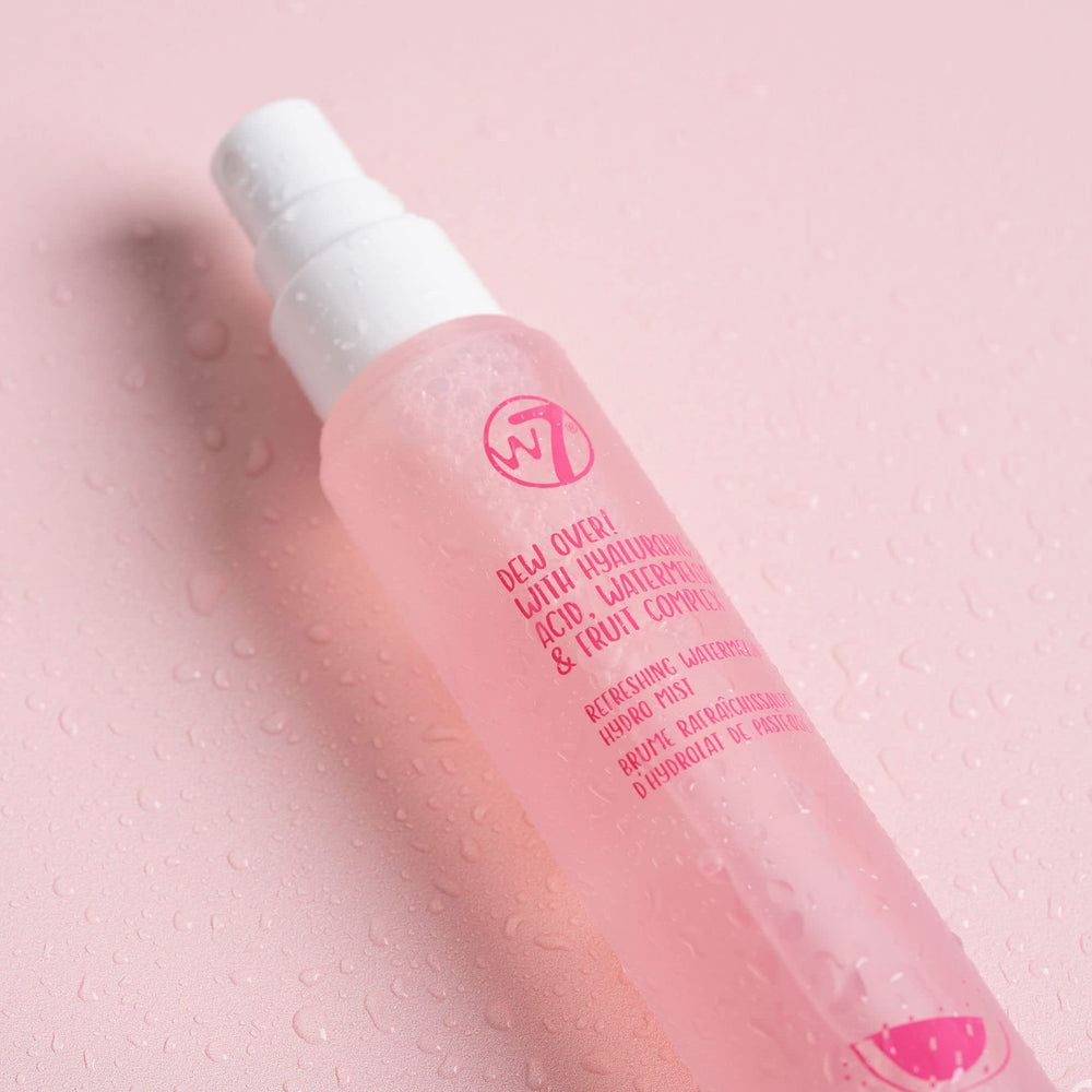 W7 Dew Over! mist application on skin emphasizes easy mid-day refresh and soft touch