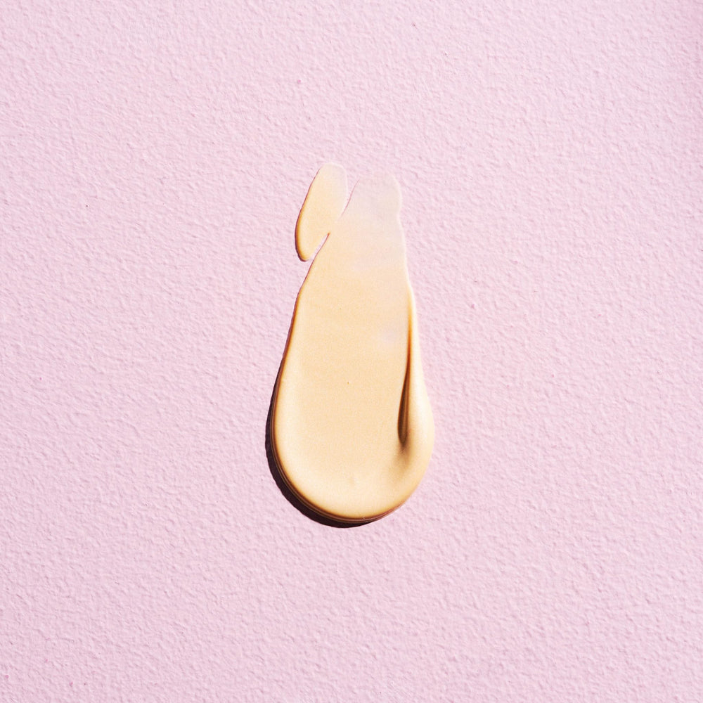 W7 Dewy Glow Drops applied with fingertips for a subtle cheek highlight.