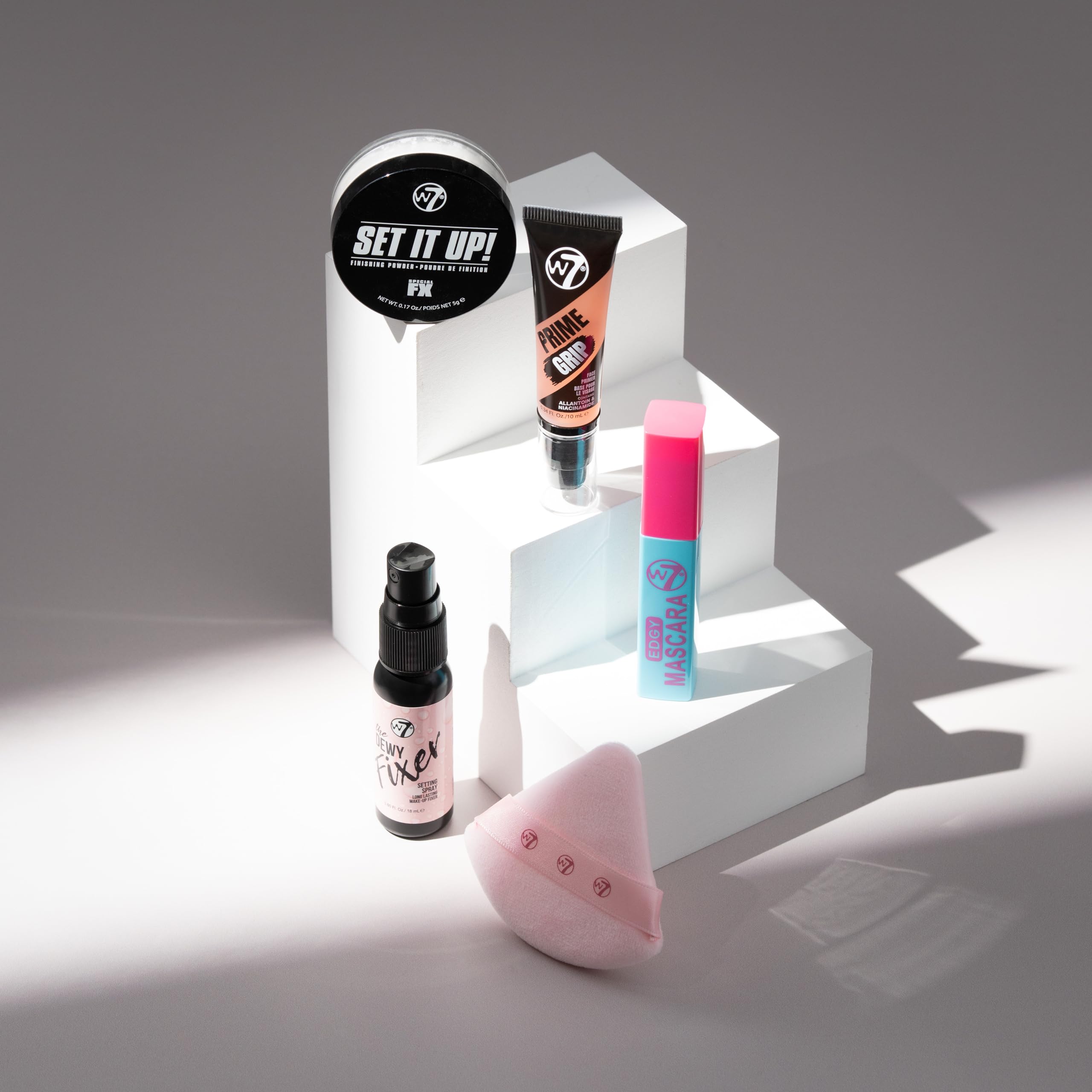 W7 On the Go Cuties powder puff for smooth, even powder application.
