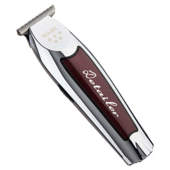 Wahl Professional cordless detailer Li T Wide Blade held for precise edging.