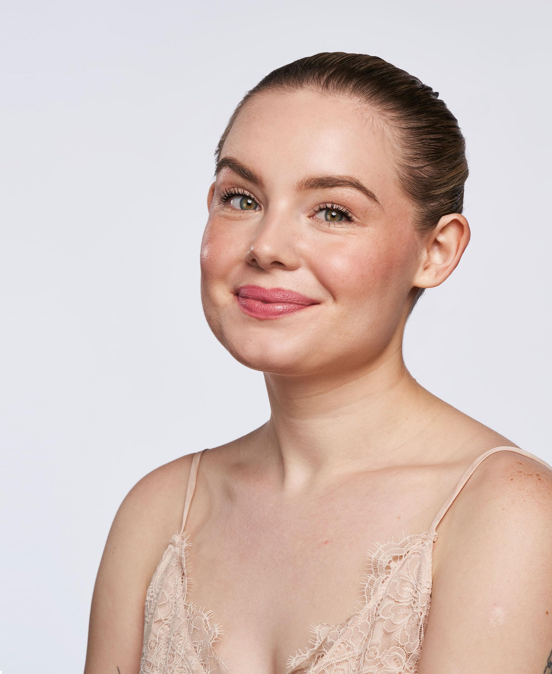 Wander Beauty dual-ended highlighter stick with soft-focus glow close-up